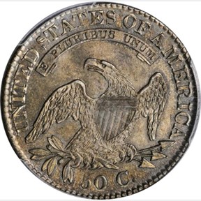 Raw reverse image of an 1823 Capped Bust Half Dollar with an eagle holding arrows