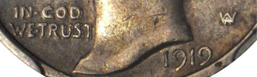Close up of a 1919 doubled die obverse dime.