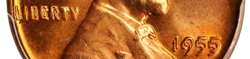 Close up of a 1955 Lincoln cent with a double die variety on the obverse.