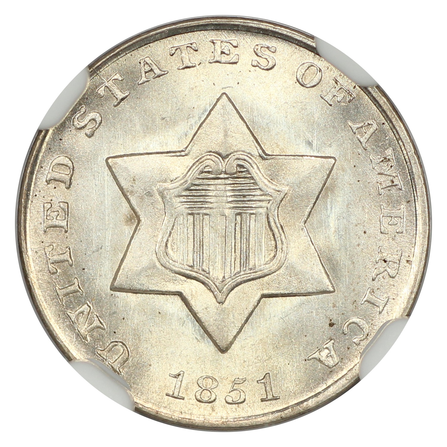 The obverse of a raw 1851 3-cent silver piece.