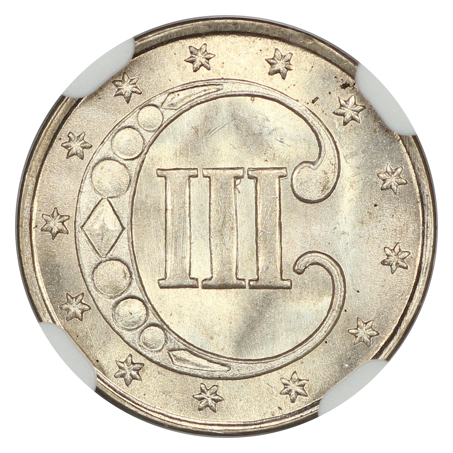 The reverse of a raw 1851 3-cent silver piece.
